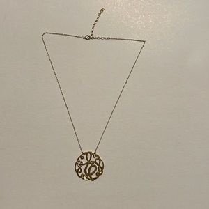Gold cursive letter “E” monogram initial necklace